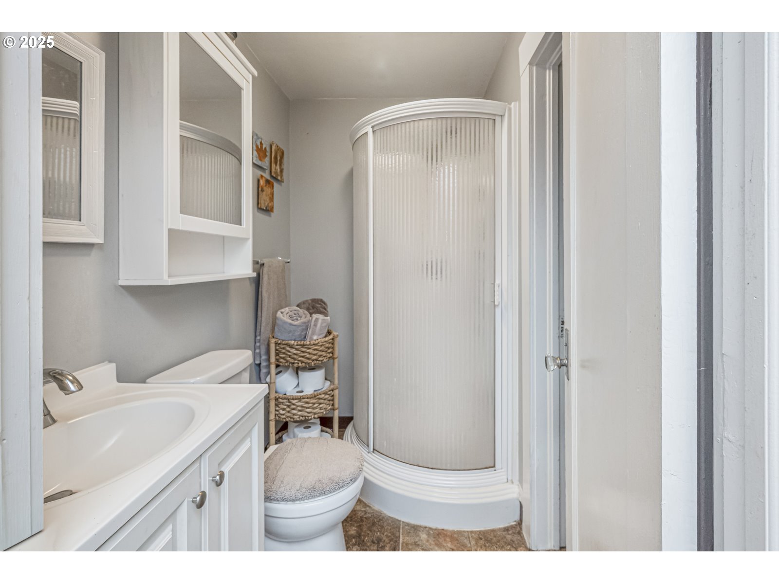 6125 Southeast 138th Place Portland, OR 97236 - Photo 19 of 32 a bathroom with a sink toilet and shower