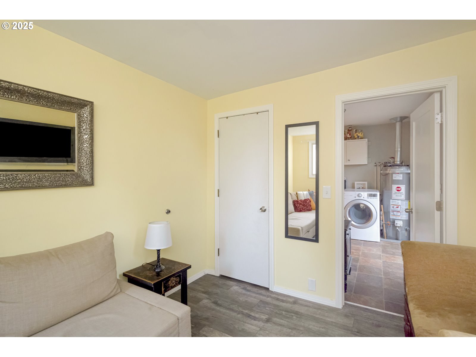 6125 Southeast 138th Place Portland, OR 97236 - Photo 20 of 32 a living room with furniture and a flat screen tv