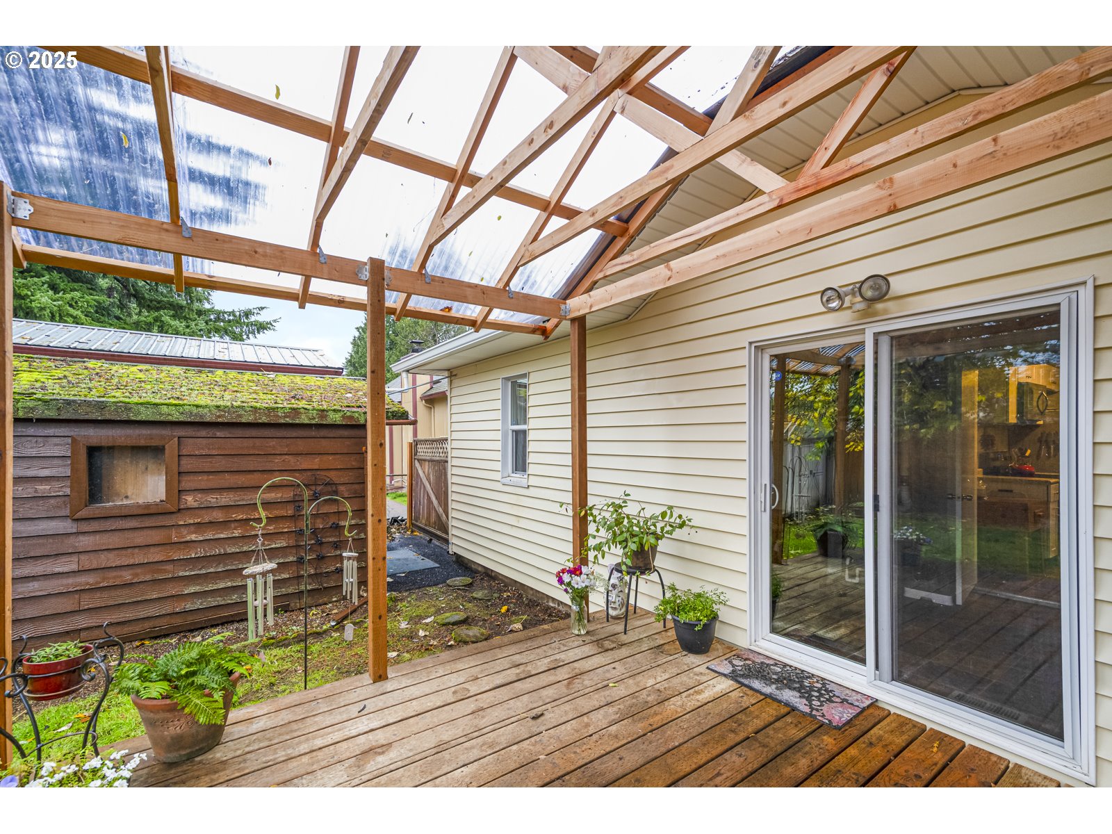 6125 Southeast 138th Place Portland, OR 97236 - Photo 25 of 32 a view of backyard with a porch
