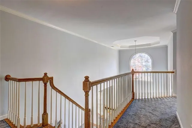 a view of a hallway with windows