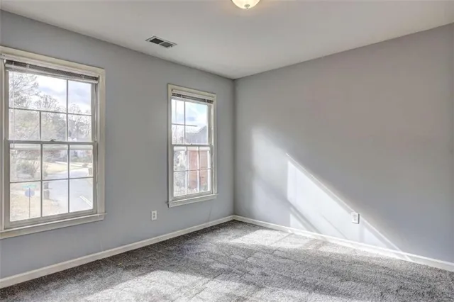 an empty room with windows