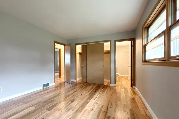 a view of room with window and floor to ceiling window