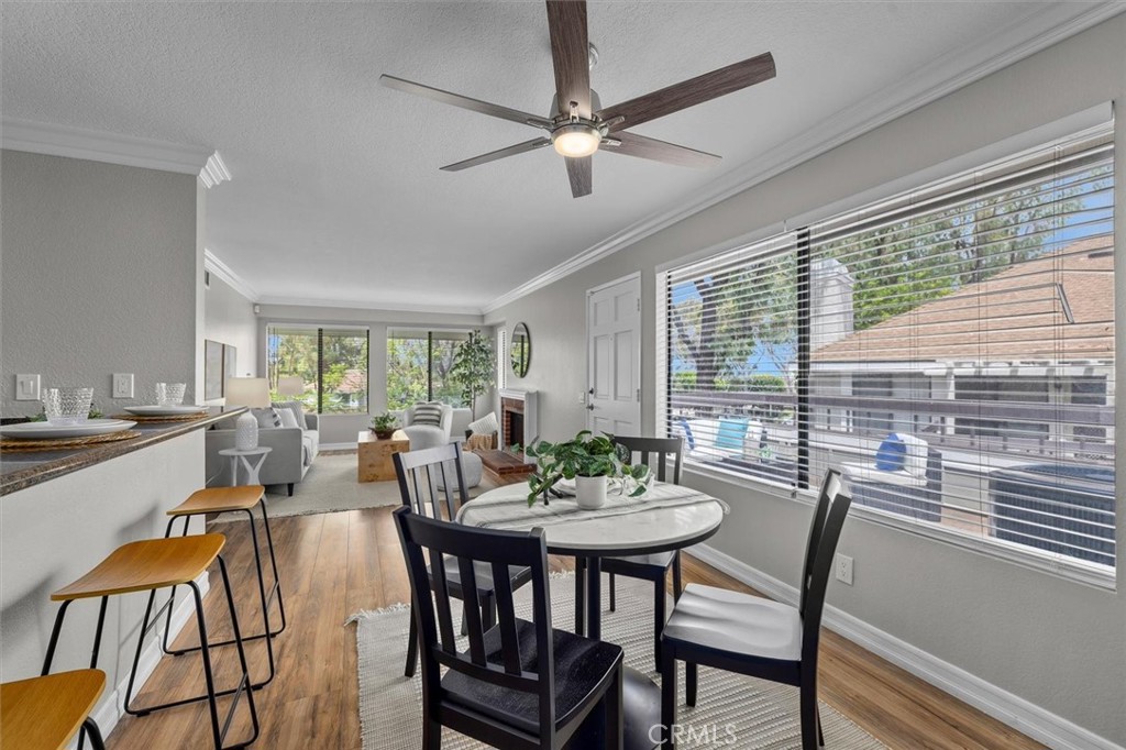 22206 Rim Pointe, Unit 7G Lake Forest, CA 92630 - Photo 13 of 39 a view of a dining room with furniture window and outside view