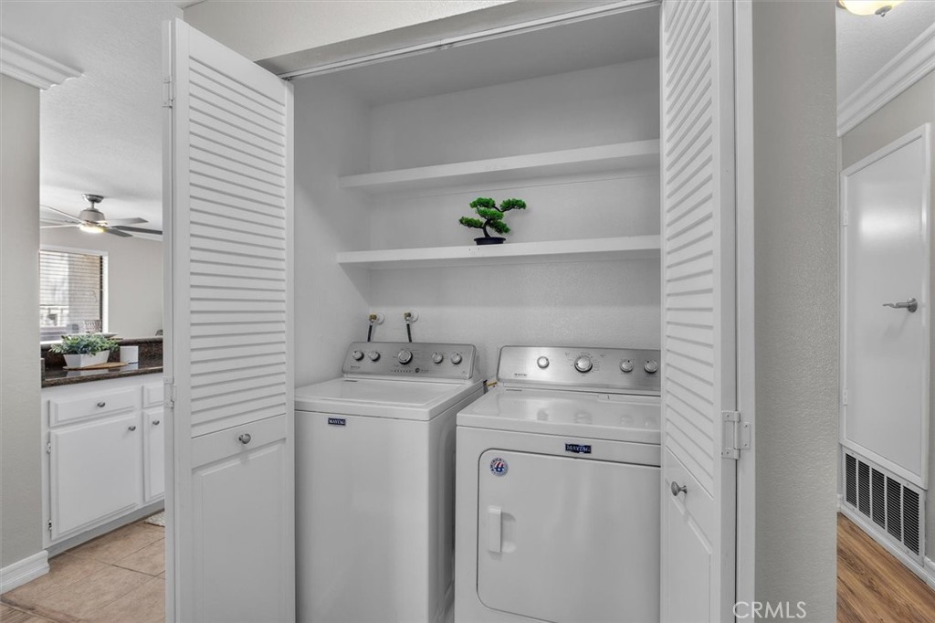 22206 Rim Pointe, Unit 7G Lake Forest, CA 92630 - Photo 22 of 39 a view of washer and dryer