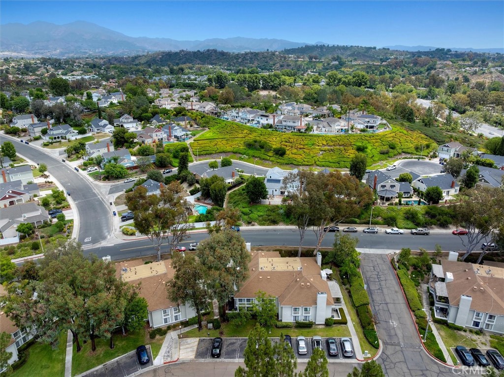 22206 Rim Pointe, Unit 7G Lake Forest, CA 92630 - Photo 33 of 39 an aerial view of multiple house