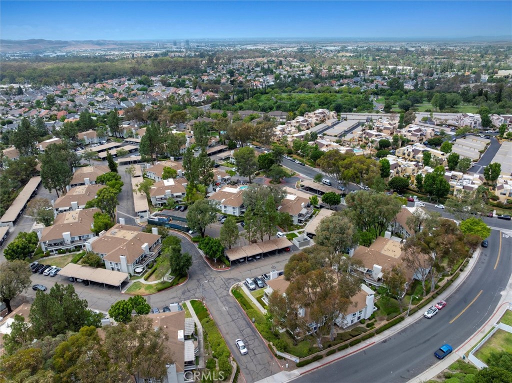 22206 Rim Pointe, Unit 7G Lake Forest, CA 92630 - Photo 36 of 39 an aerial view of residential houses with outdoor space