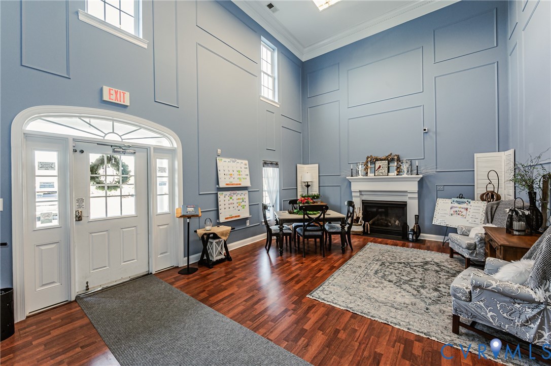 7622 Settlers Ridge Court Henrico, VA 23231 - Photo 38 of 43 a living room with furniture a fireplace and wooden floor