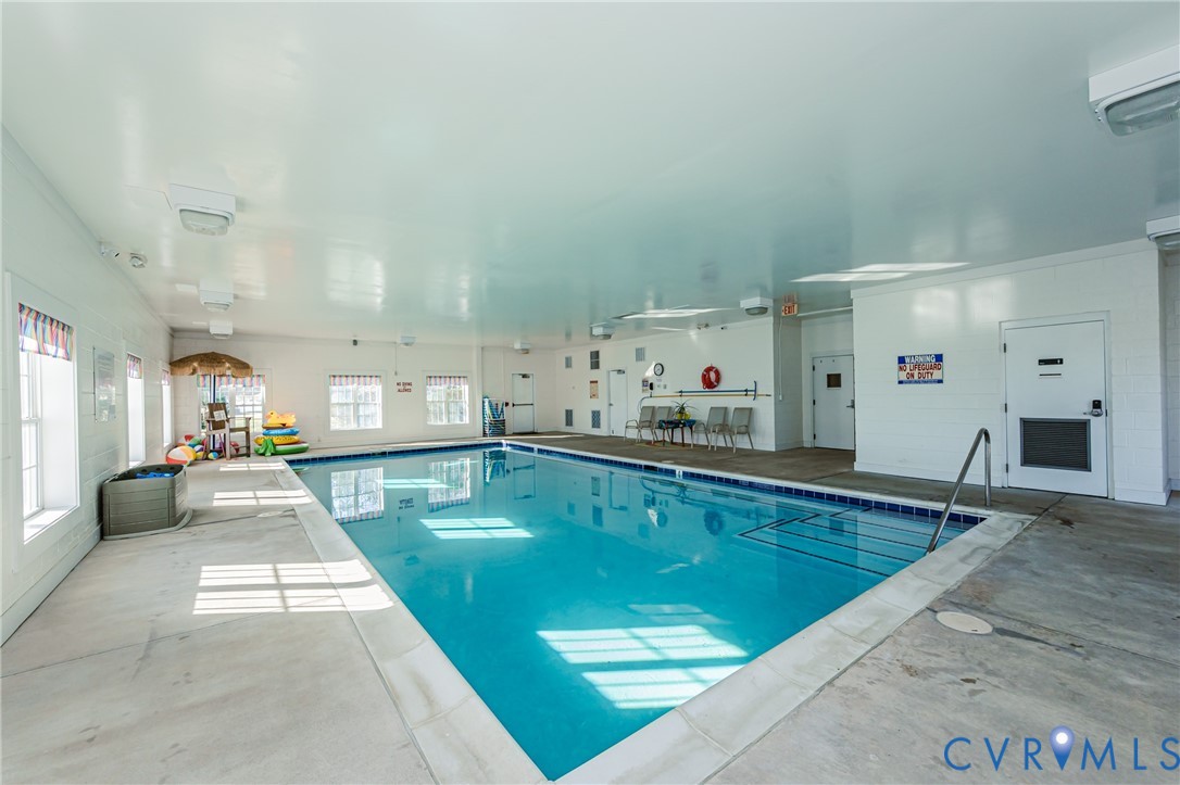 7622 Settlers Ridge Court Henrico, VA 23231 - Photo 42 of 43 a large white kitchen with lots of counter top space
