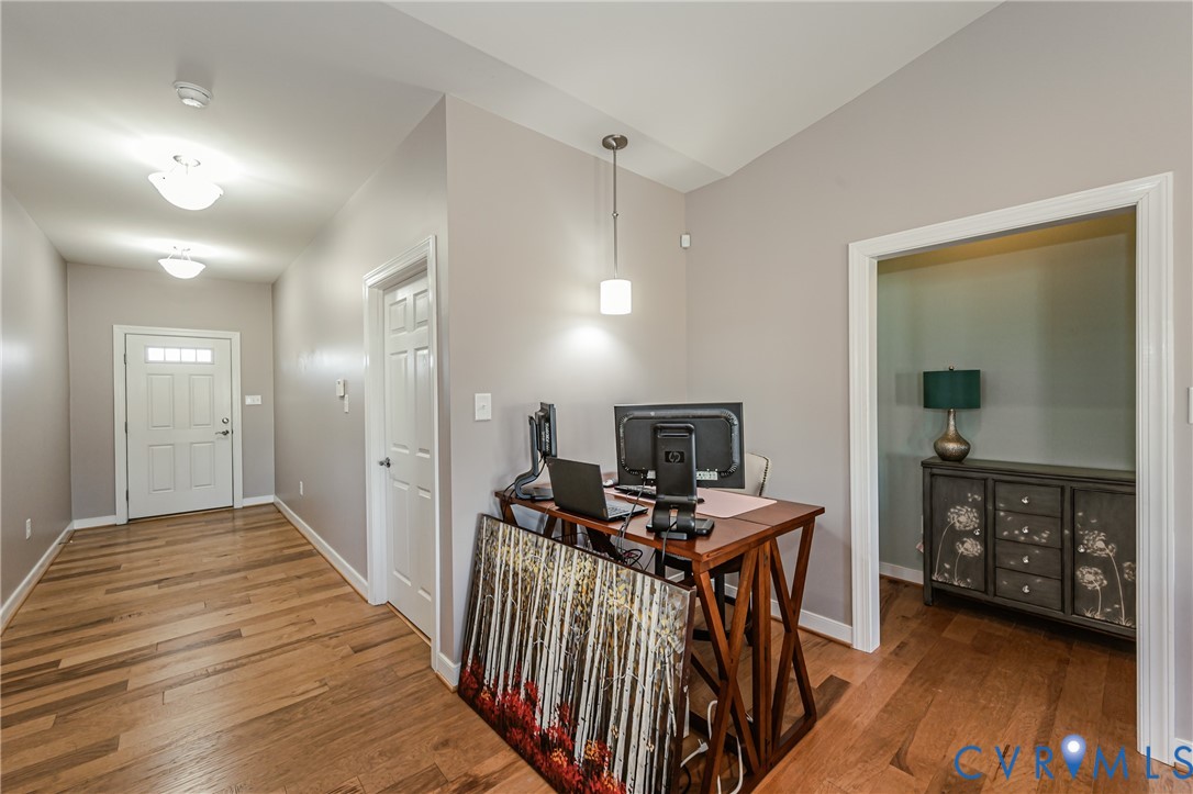 7622 Settlers Ridge Court Henrico, VA 23231 - Photo 8 of 43 a view of a hallway to a livingroom with furniture
