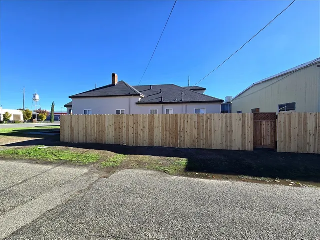 a view of a backyard of a house