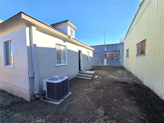 a view of a house with swimming pool