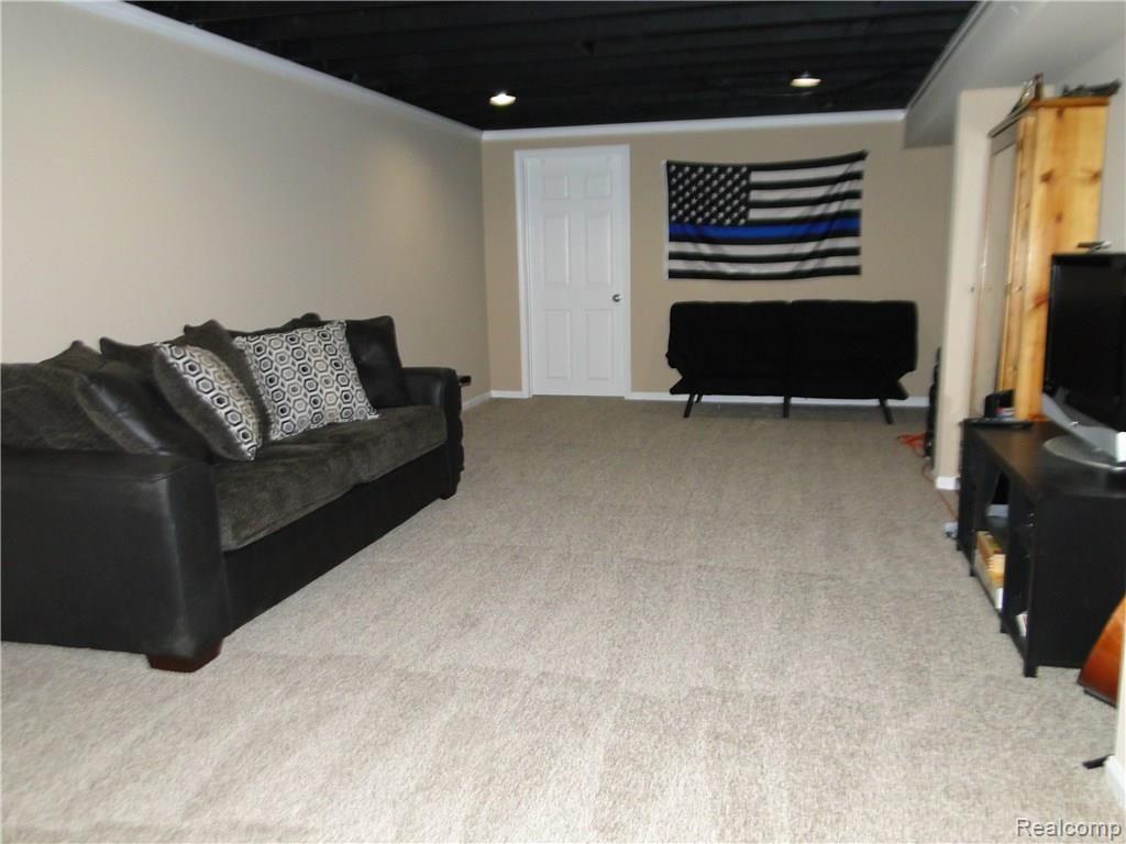 5090 Mt Morris Road Columbiaville, MI 48421 - Photo 24 of 41 Family Room.JPG