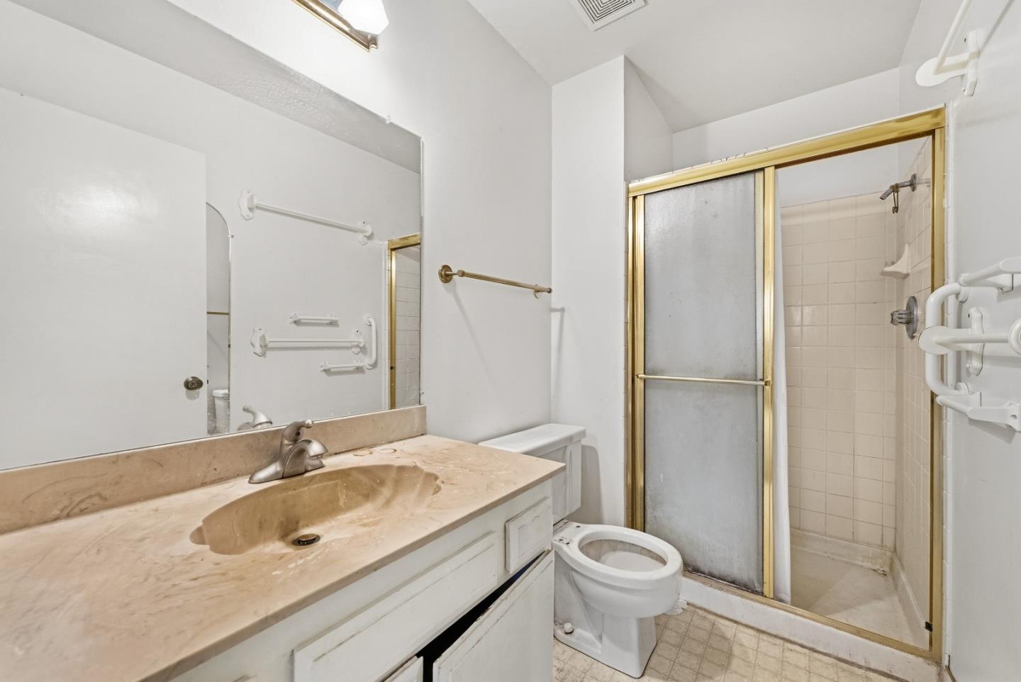 45811 Cheyenne Place Fremont, CA 94539 - Photo 34 of 44 a bathroom with a sink toilet and shower