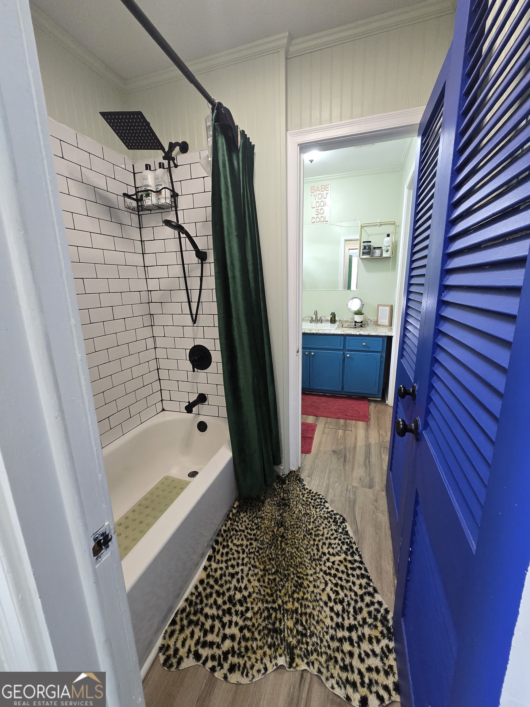 406 Pinelea Road Griffin, GA 30223 - Photo 16 of 53 a bathroom with a bathtub and a shower