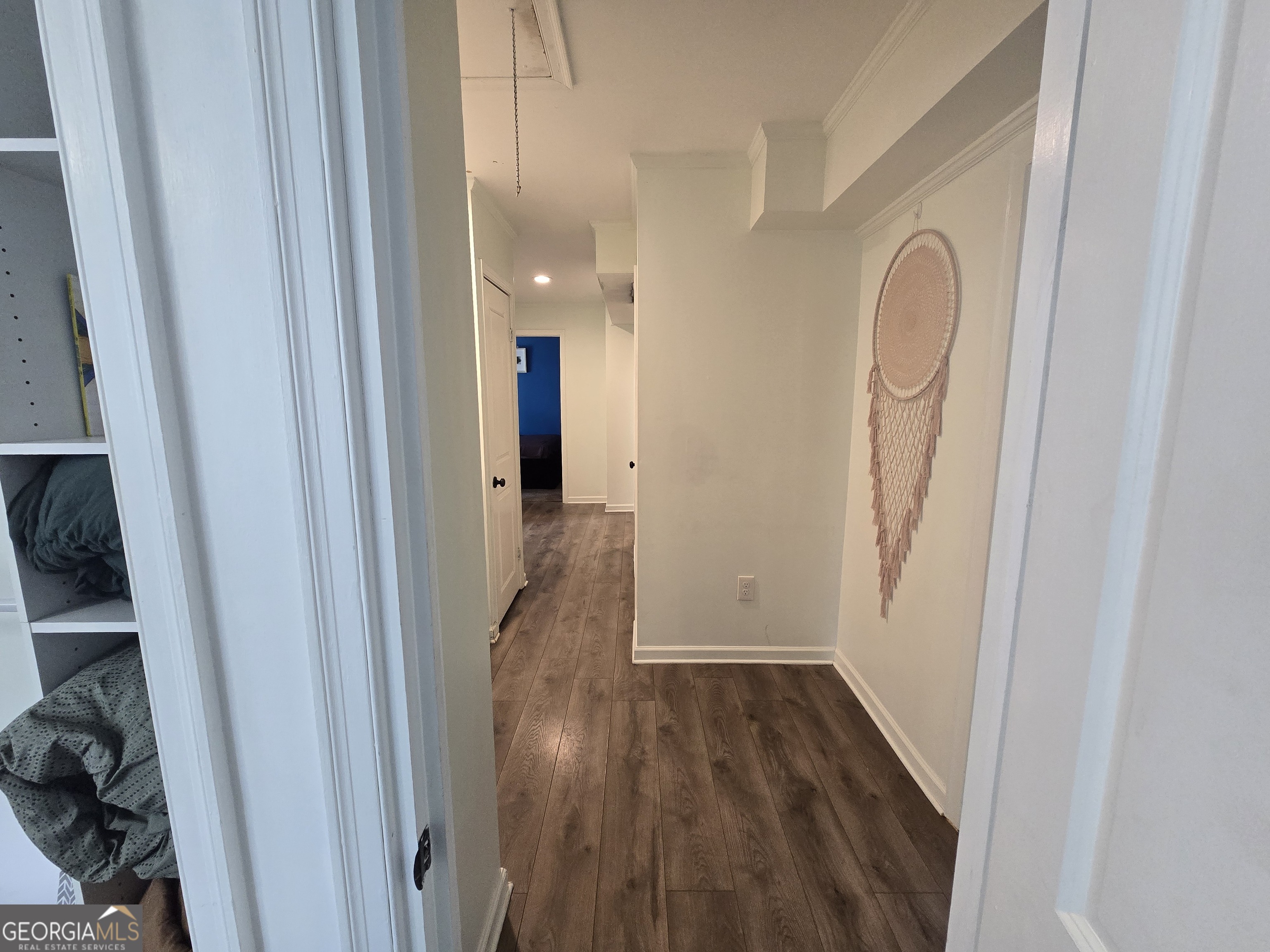 406 Pinelea Road Griffin, GA 30223 - Photo 20 of 53 a view of a hallway with wooden floor and a sink