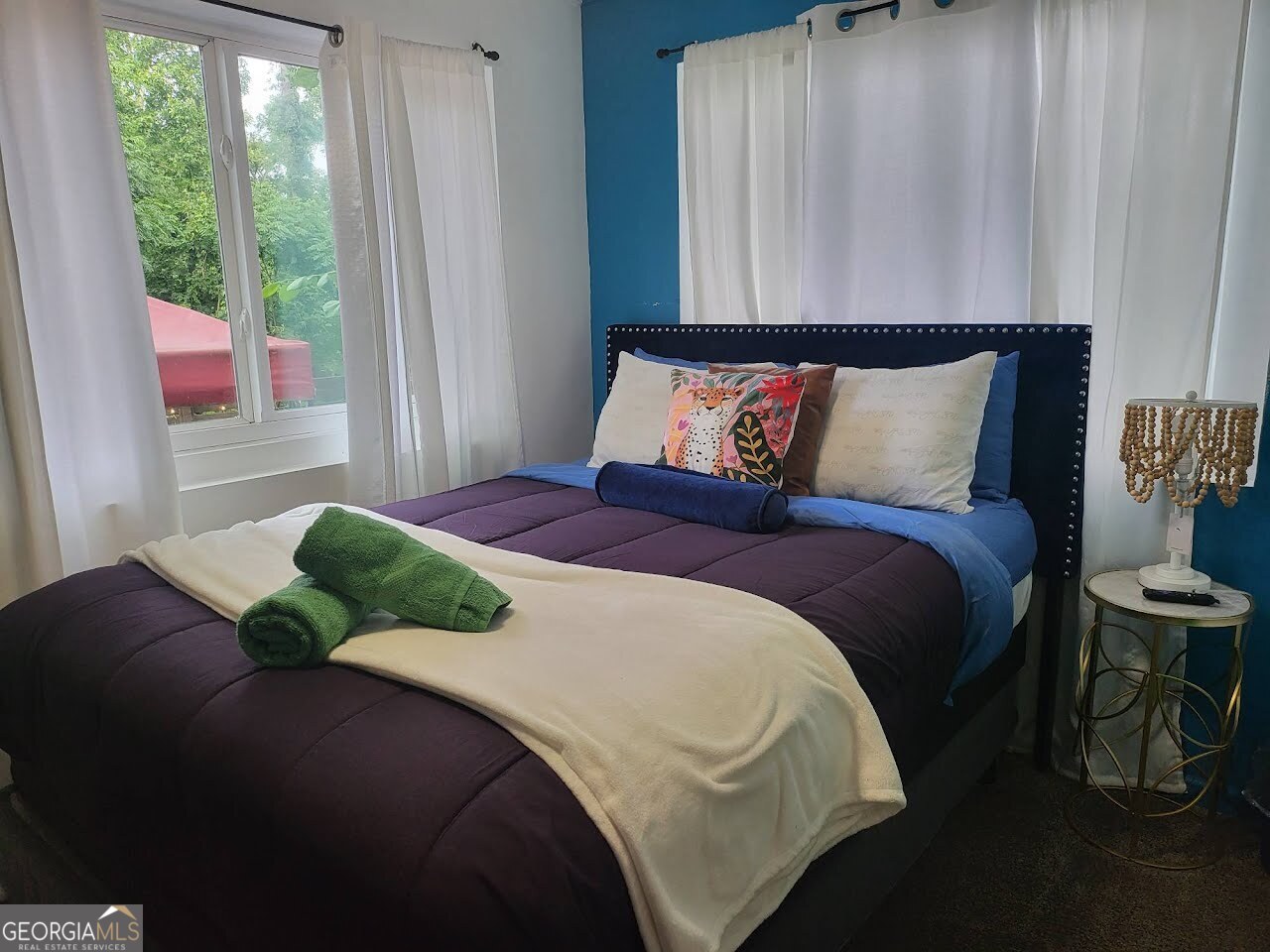 406 Pinelea Road Griffin, GA 30223 - Photo 32 of 53 a bedroom with a bed and window