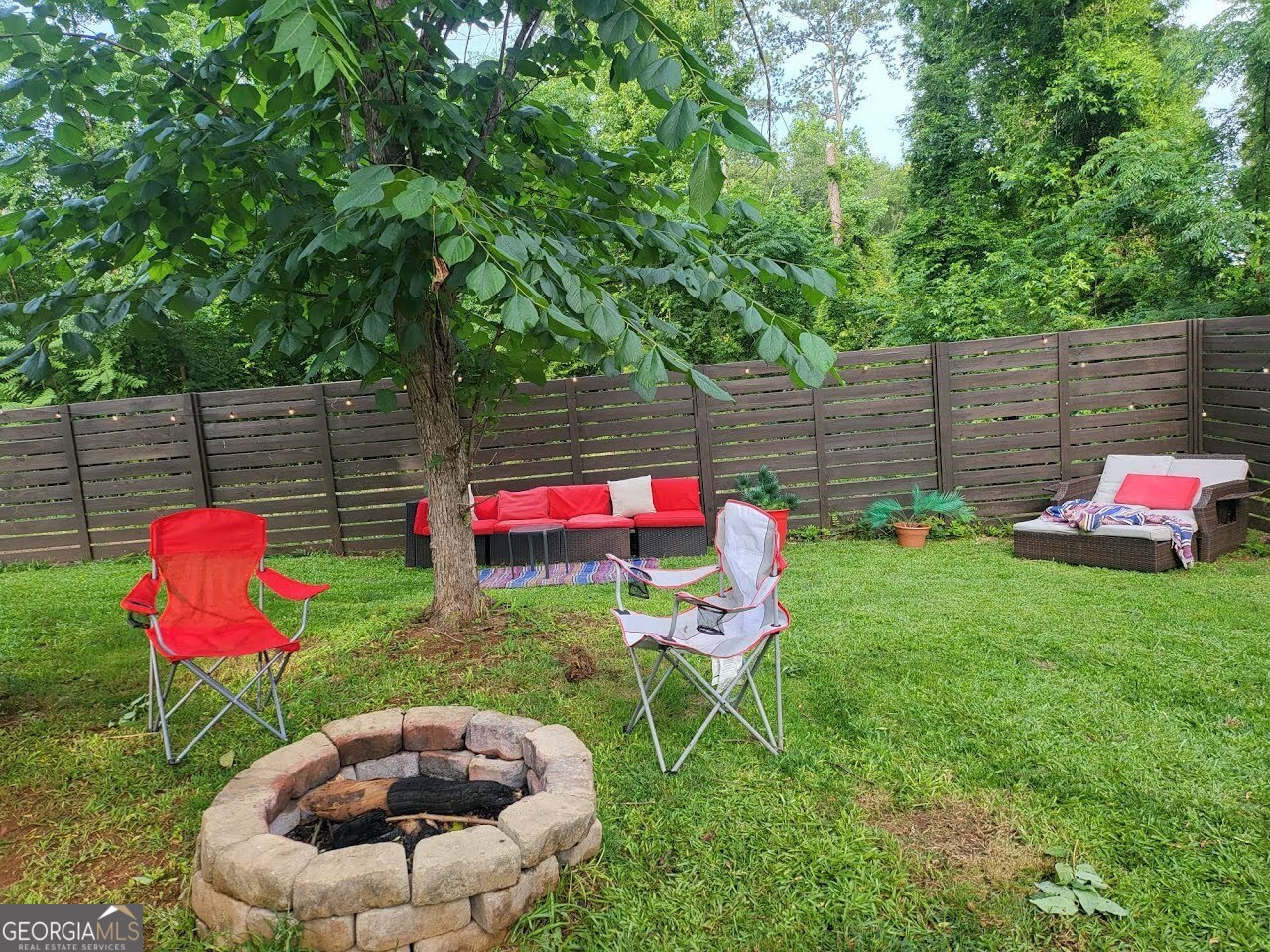 406 Pinelea Road Griffin, GA 30223 - Photo 47 of 53 a patio with table and chairs