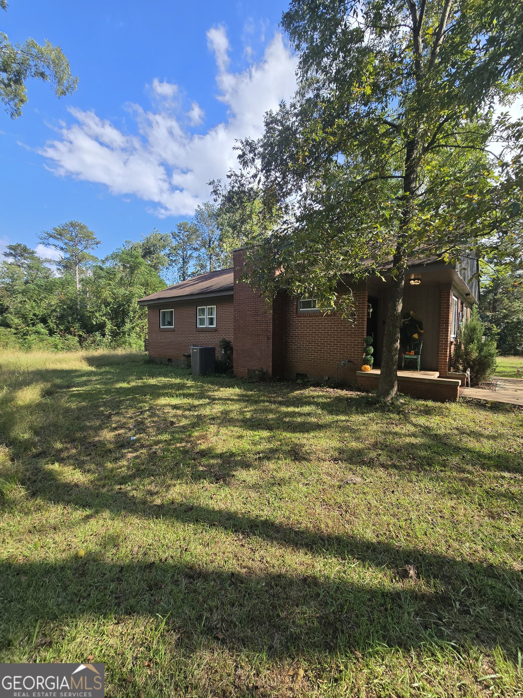 406 Pinelea Road Griffin, GA 30223 - Photo 51 of 53 a view of a house with a yard