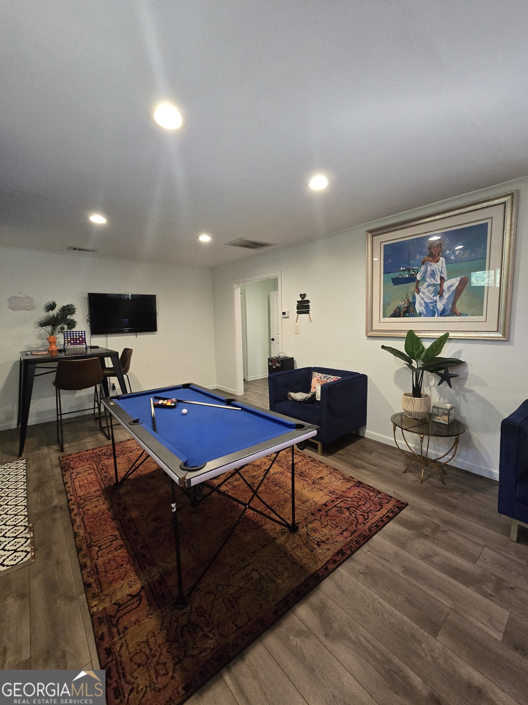 406 Pinelea Road Griffin, GA 30223 - Photo 6 of 53 a living room with furniture pool table and a rug