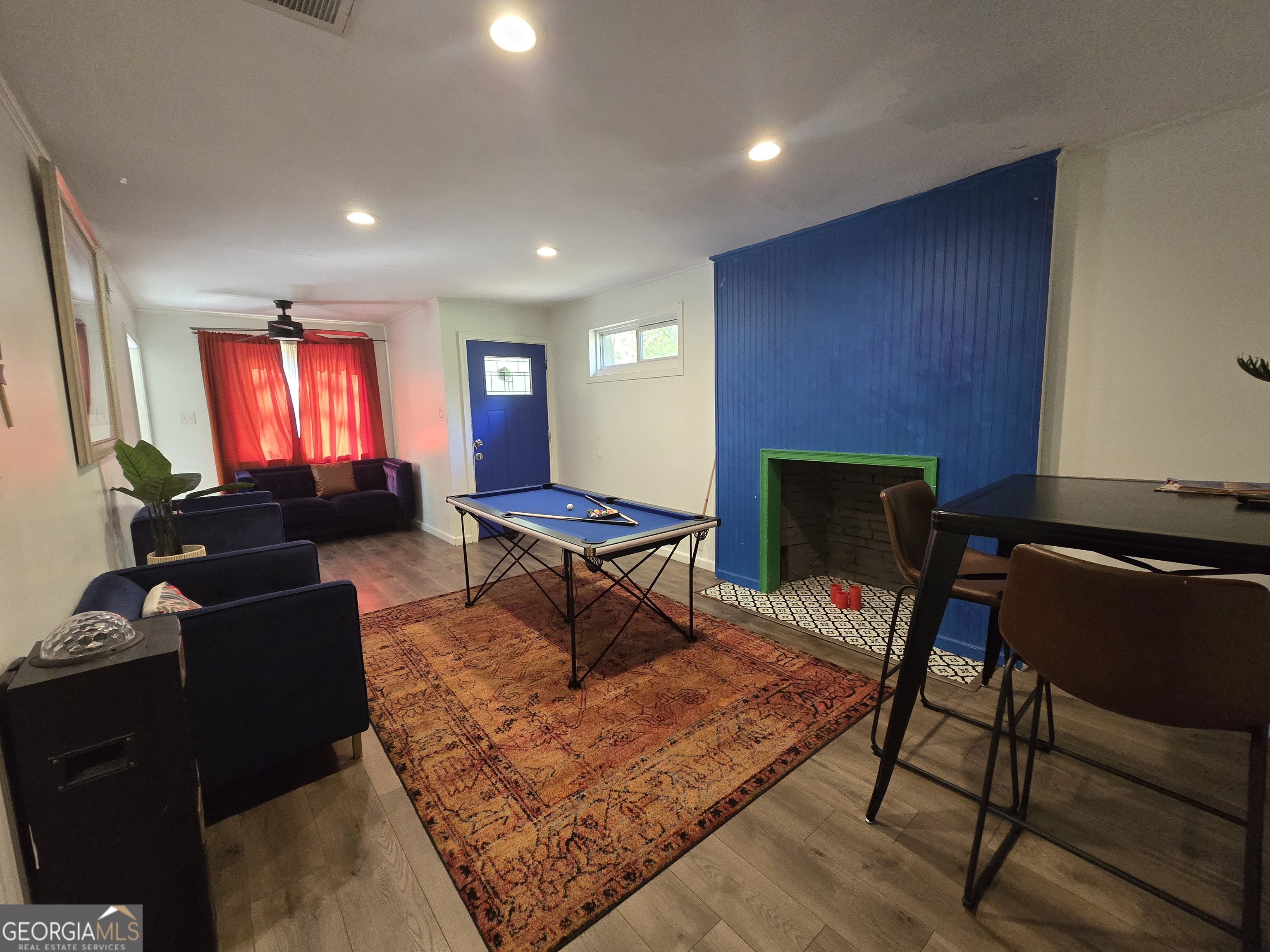 406 Pinelea Road Griffin, GA 30223 - Photo 7 of 53 a living room with furniture a rug and a window