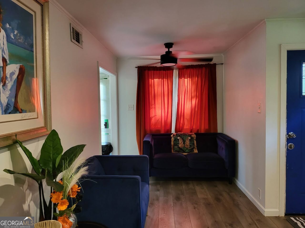 406 Pinelea Road Griffin, GA 30223 - Photo 8 of 53 a living room with furniture and a potted plant