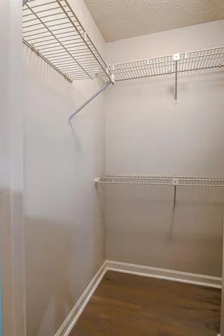 a view of a room with racks on the wall