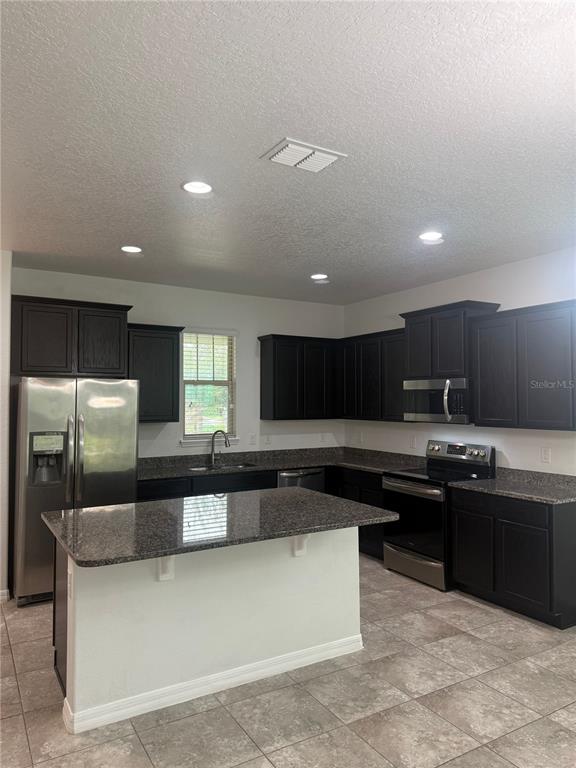 16067 Pebble Bluff Loop Winter Garden, FL 34787 - Photo 10 of 44