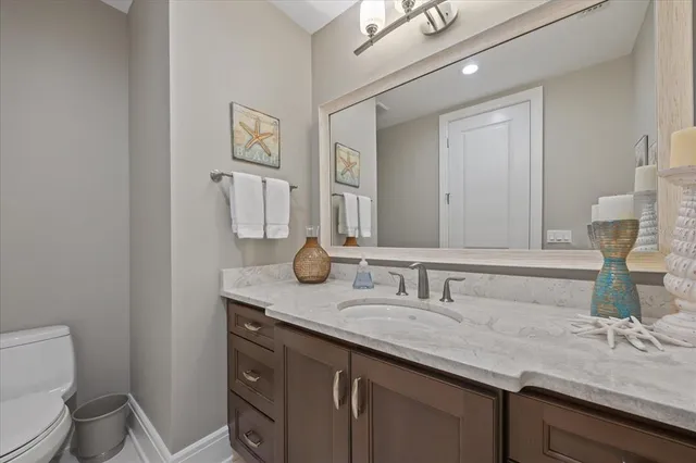 a bathroom with a sink double vanity and a mirror