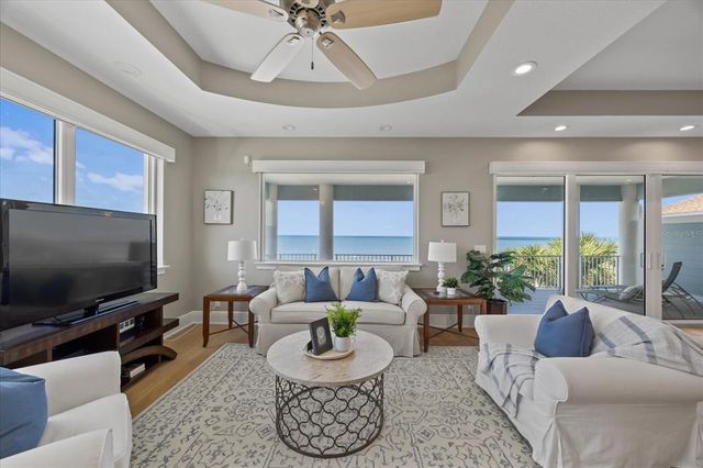 a view of a house with a fountain