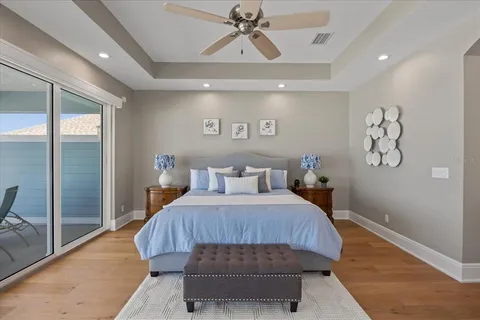 a front view of a house with yard and green space