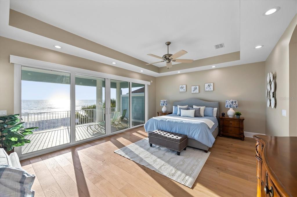 2 Gulf Boulevard Indian Rocks Beach, FL 33785 - Photo 56 of 79 a bed sitting in a spacious bedroom next to a window
