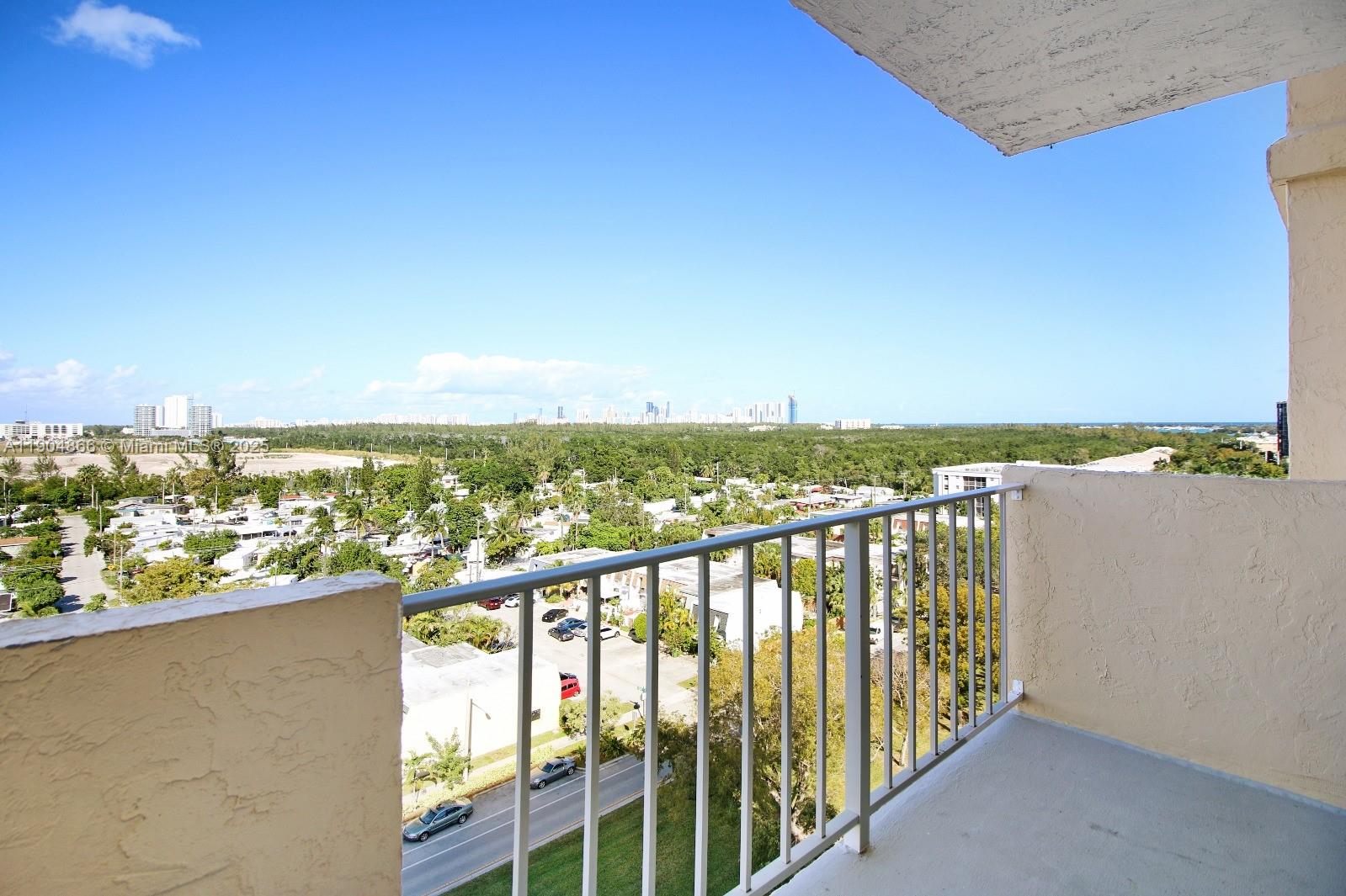 2350 Northeast 135th Street, Unit 1111 North Miami, FL 33181 - Photo 12 of 21 a view of city and ocean