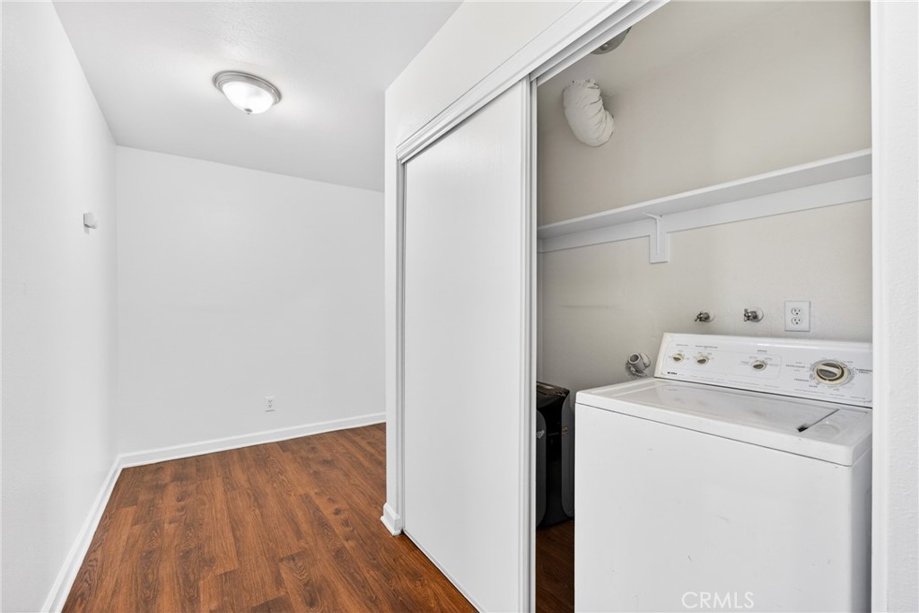 24867 Bower Street Moreno Valley, CA 92553 - Photo 12 of 46 a utility room with dryer and washer