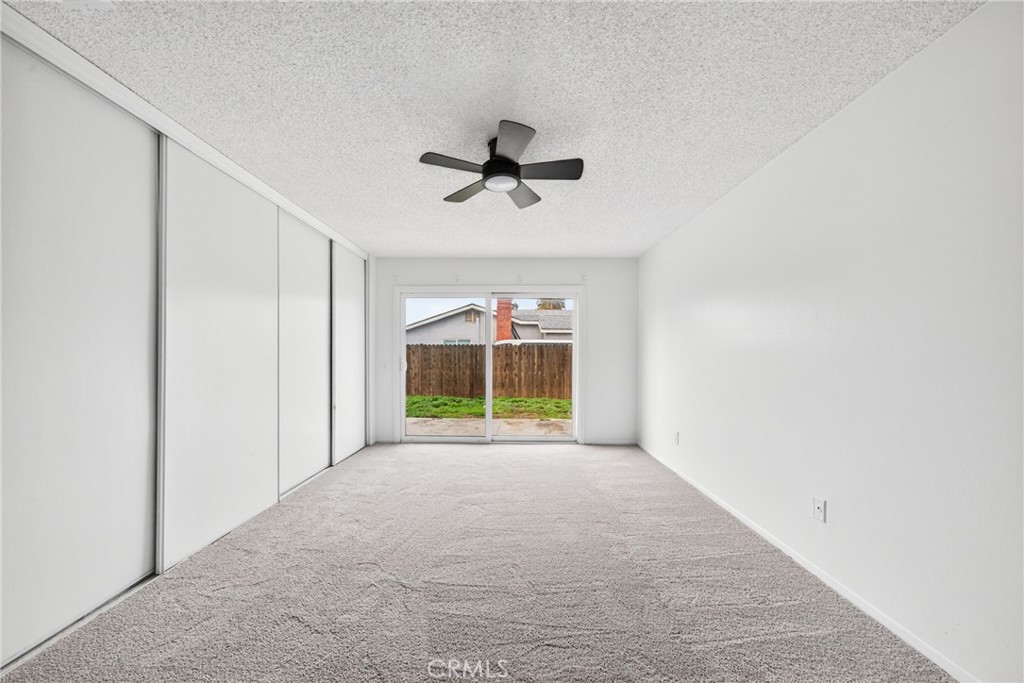 24867 Bower Street Moreno Valley, CA 92553 - Photo 32 of 46 a view of an empty room with a window