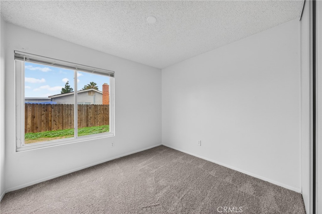 24867 Bower Street Moreno Valley, CA 92553 - Photo 36 of 46 an empty room with a window