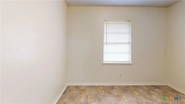 a view of a small space with window