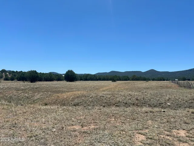 a view of lake and mountain