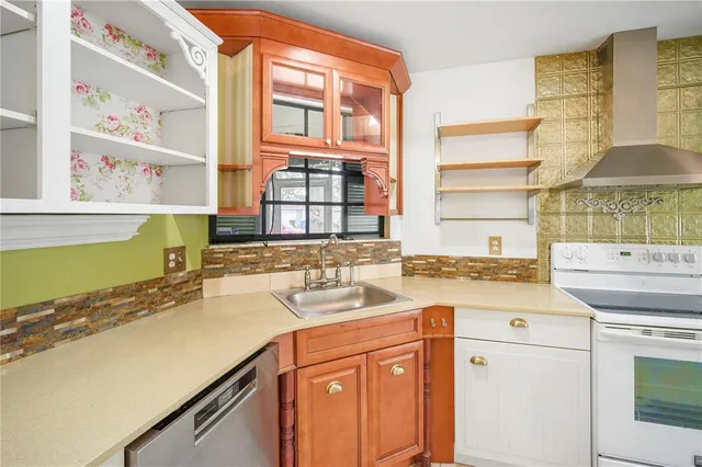 a kitchen with a sink and a window