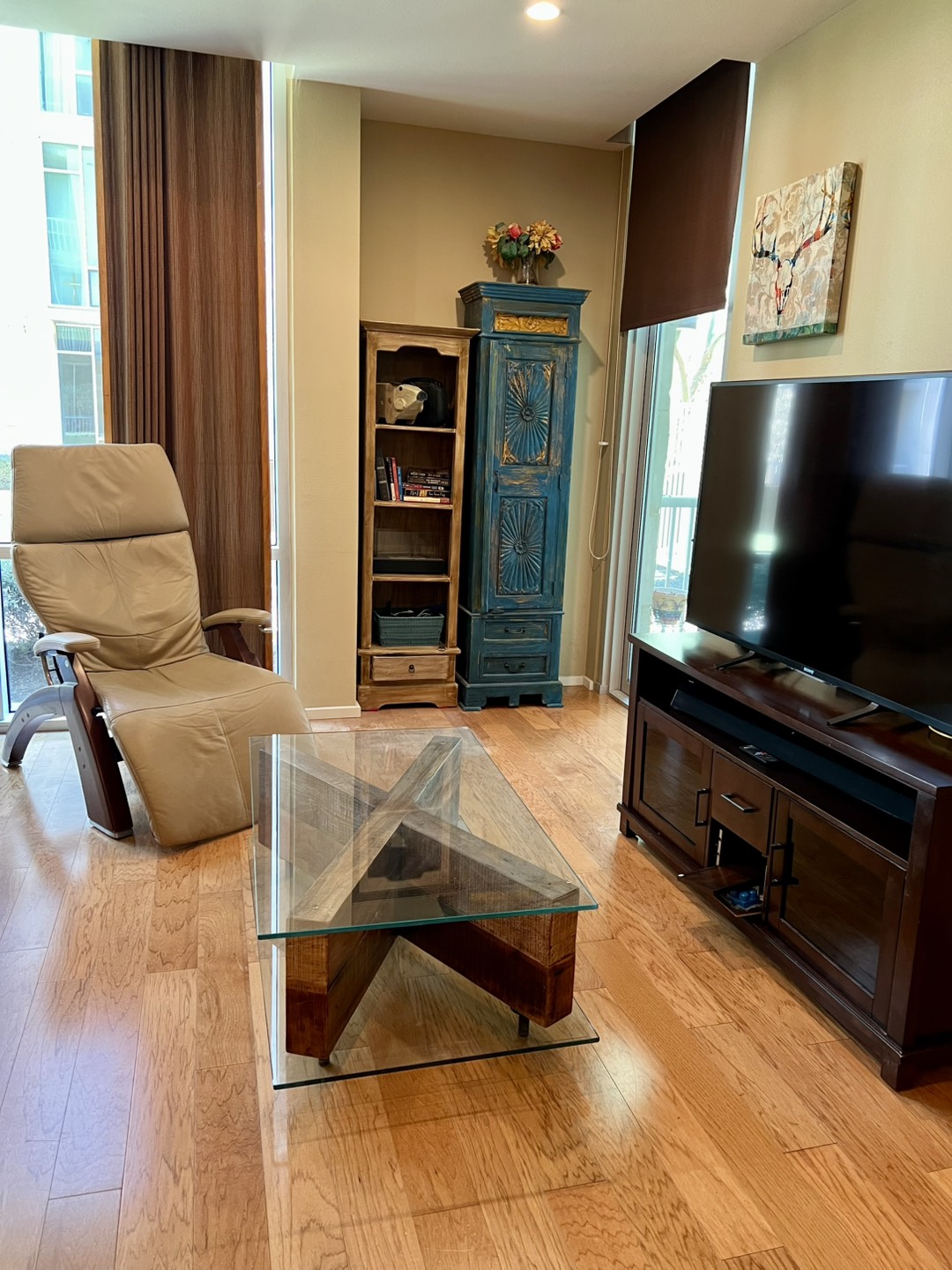 1600 Barton Springs Road, Unit 3102 Austin, TX 78704 - Photo 3 of 7 a living room with furniture and a flat screen tv