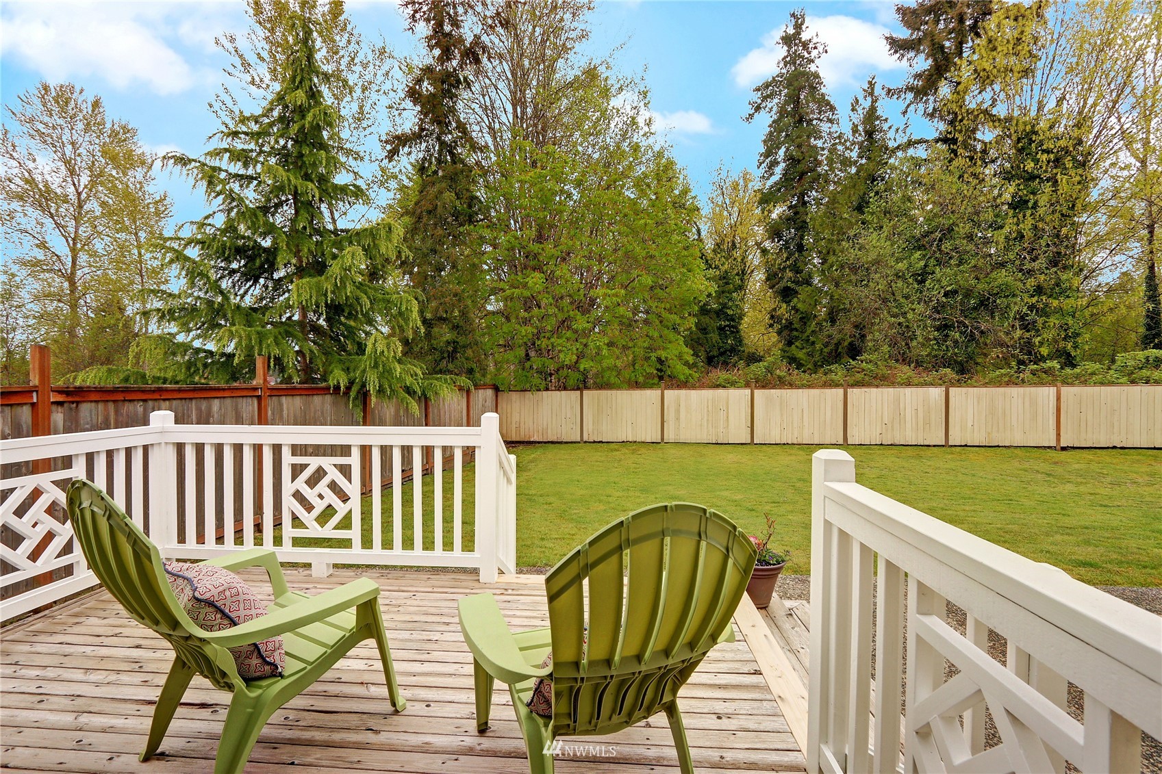 1412 234th Street Southwest Bothell, WA 98021 - Photo 18 of 20 a view of a chair and table on the deck