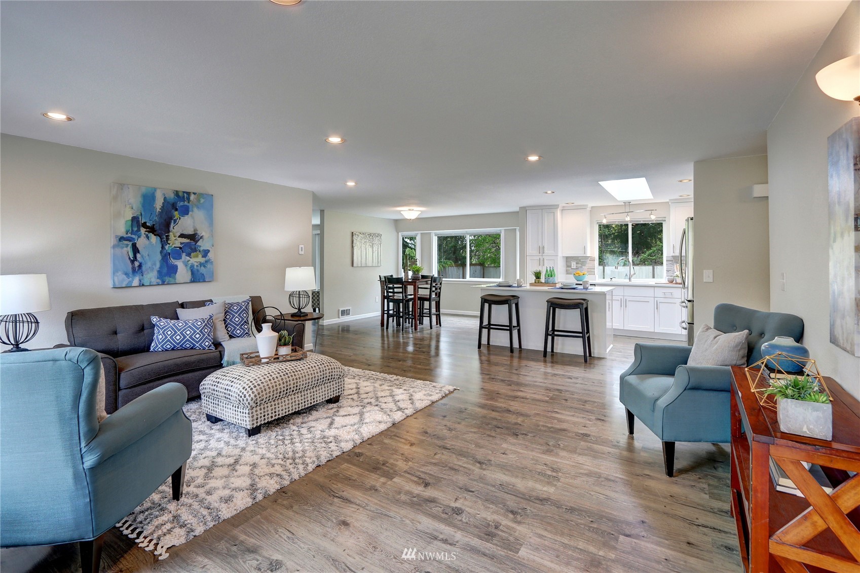 1412 234th Street Southwest Bothell, WA 98021 - Photo 3 of 20 a living room with furniture and a wooden floor