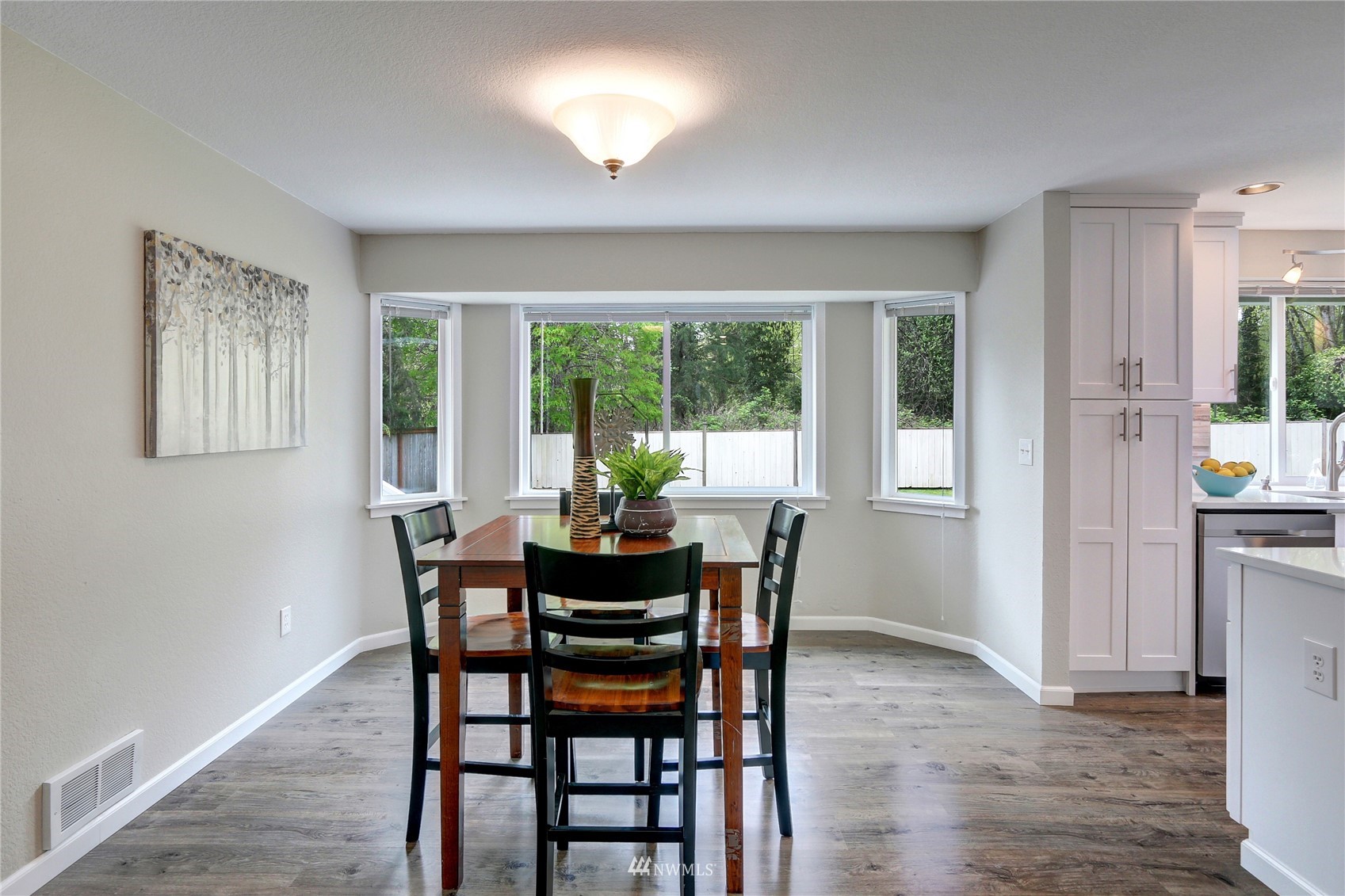 1412 234th Street Southwest Bothell, WA 98021 - Photo 9 of 20 a dining room with furniture and window