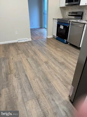 a view of kitchen and microwave