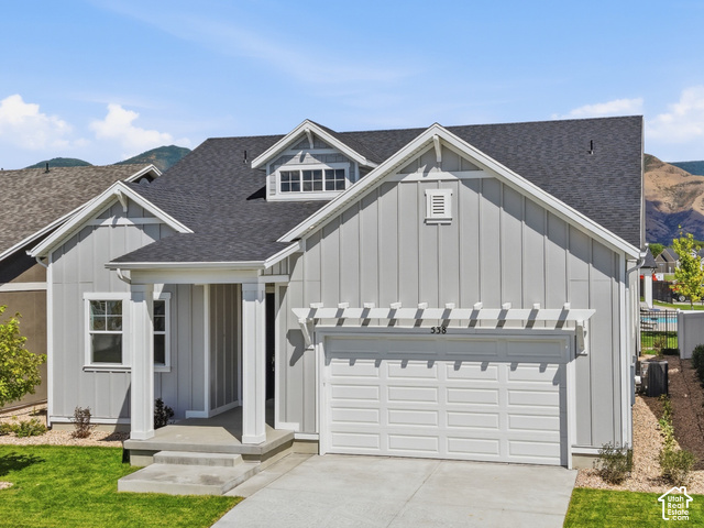 538 North Legend Circle, Unit 505 Mapleton, UT 84664 - Photo 2 of 48 Contemporary exterior with light gray siding and dark roof