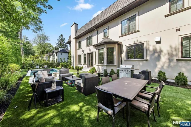 a house with garden in front of it