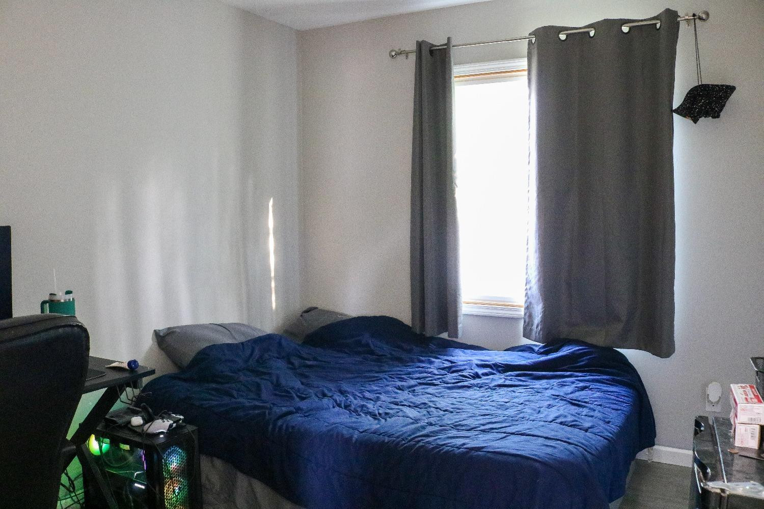 8469 Morse Court Crown Point, IN 46307 - Photo 16 of 33 a bedroom with a bed and a closet