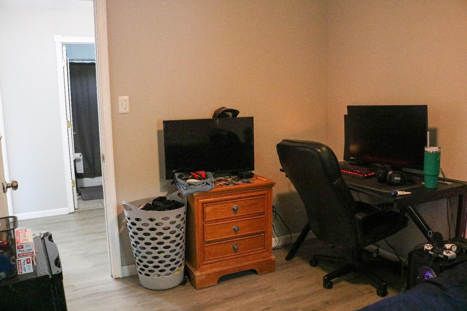 8469 Morse Court Crown Point, IN 46307 - Photo 17 of 33 a room with furniture and flat screen tv