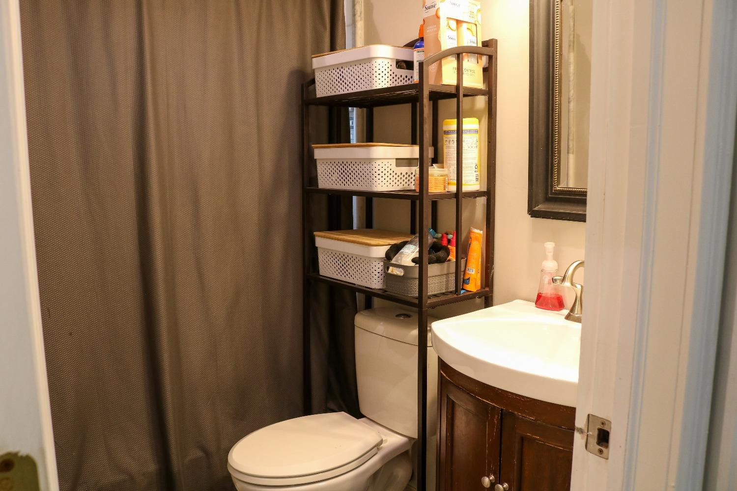 8469 Morse Court Crown Point, IN 46307 - Photo 18 of 33 a bathroom with a sink toilet and shower