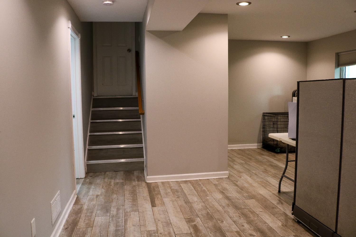 8469 Morse Court Crown Point, IN 46307 - Photo 19 of 33 a view of an empty room and stairs