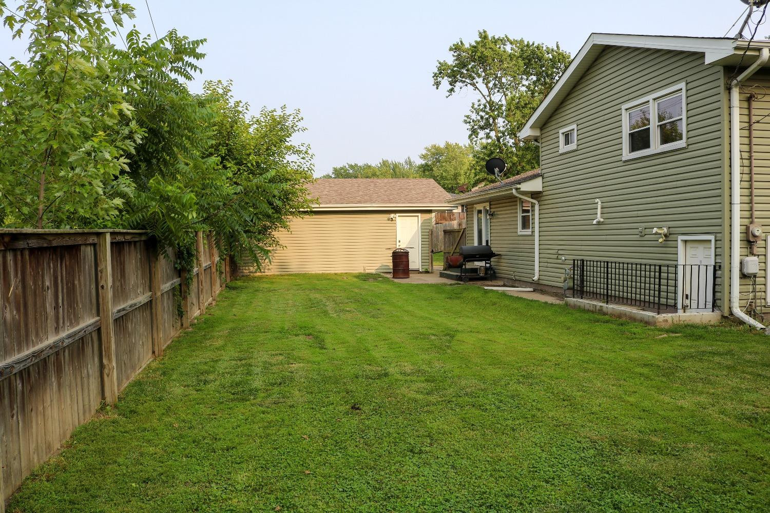 8469 Morse Court Crown Point, IN 46307 - Photo 27 of 33 a front view of a house with yard and green space